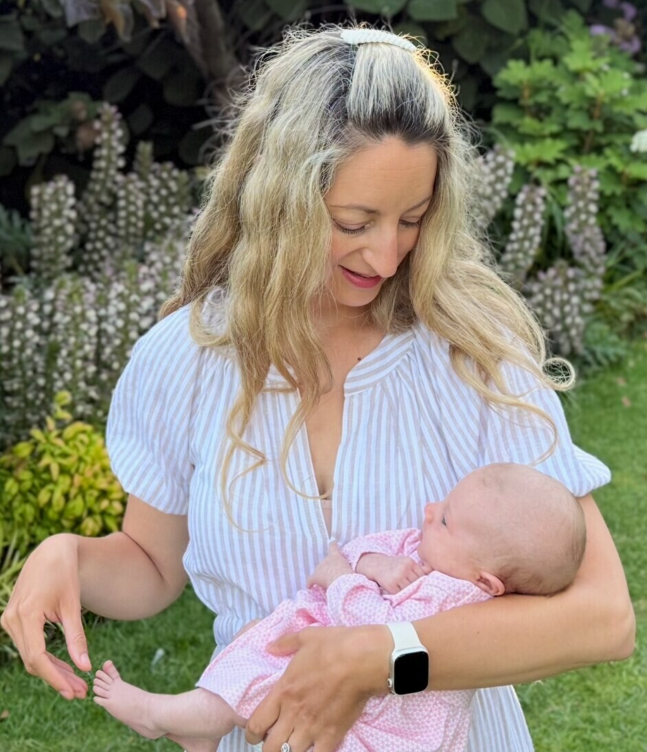 Sophie Stetson holding her baby